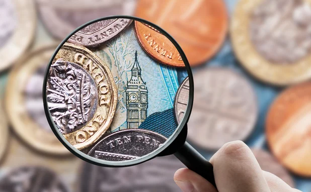 money-magnifying-glass