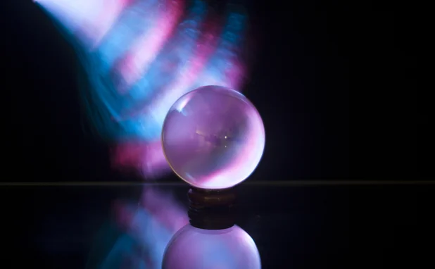 crystal ball lit by blue and pink fiber optics