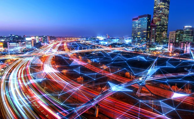 City rush hour time lapse at dusk overlaid by digital nodal grid