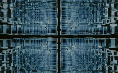 Abstract digital structure of translucent blue cubes forming a symmetrical grid-like tunnel with a glowing cross shape at the center, evoking themes of data architecture, AI systems, and virtual environments.