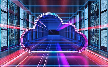 A cloud icon in between racks of servers in data centre 