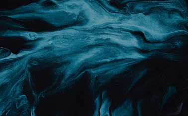 Smooth, wave-like patterns with smoky swirls and marble-inspired details, creating a dramatic and modern aesthetic.