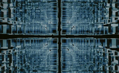 Abstract digital structure of translucent blue cubes forming a symmetrical grid-like tunnel with a glowing cross shape at the center, evoking themes of data architecture, AI systems, and virtual environments.