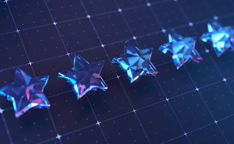 Five Crystal Stars On A Grid Background in Futuristic Blue Light - stock photo