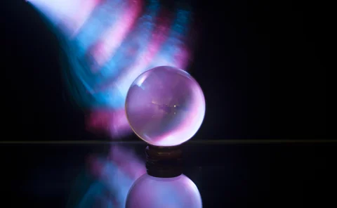 crystal ball lit by blue and pink fiber optics