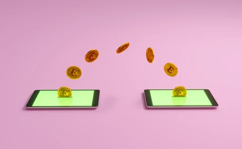 Gold bitcoin coins moving between two glowing tablets, symbolizing peer to peer crypto payment, digital wallet transfer, online transaction, fintech and decentralized finance. (3d render)