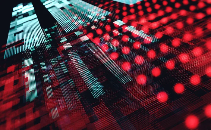 Abstract visualization of digital data flow with red and cyan pixelated patterns, representing cybersecurity threats, big data processing, and digital infrastructure