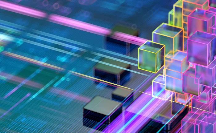 Abstract 3D cubes arranged like a digital CPU or microchip in glowing blue and teal tones with circuit-like depth