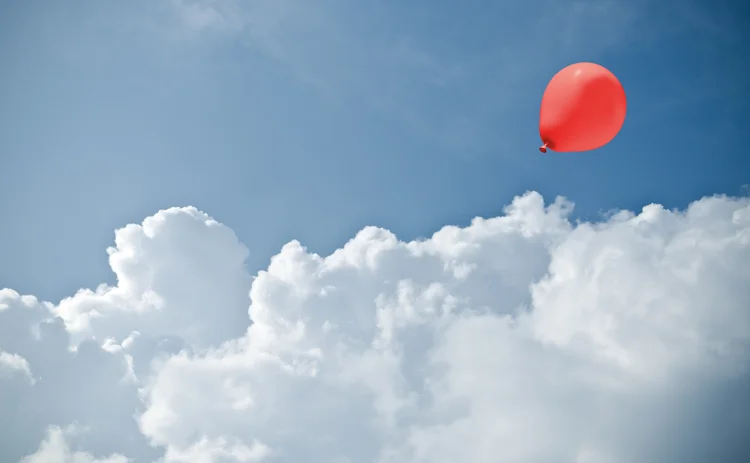 Clouds and a balloon