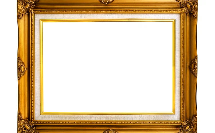 empty, ornate gold frame on white background