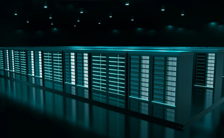 Modern data centre with rows of illuminated server racks in a dark room, showcasing high-performance computing infrastructure and cloud storage technology.