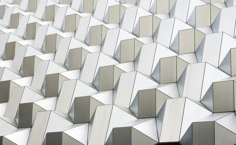 Abstract pattern of interconnected white geometric structures representing data networks, technology and digital infrastructure