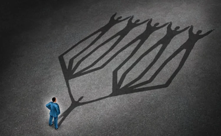 An illustration of a businessman with his hands on his hips and his shadow gives the impression of expansion An illustration of a businessman with his hands on his hips and his shadow gives the impression of expansion
