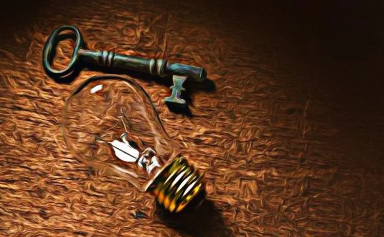 A key and lightbulb representing unlocking innovation