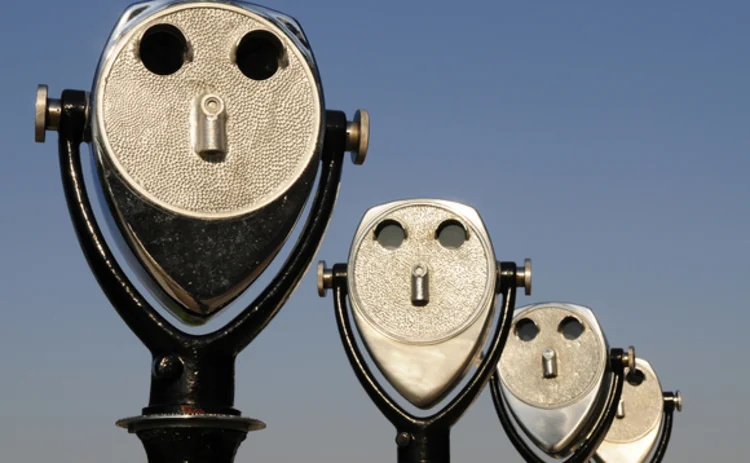 receding-row-of-four-long-range-binoculars-perspective-faces receding-row-of-four-long-range-binoculars-perspective-faces