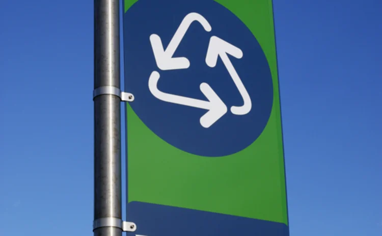 A recycling area sign