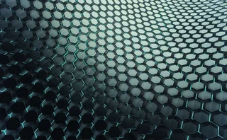 Abstract 3D hexagonal grid with glowing teal lines, creating a futuristic digital surface symbolizing data networks, blockchain, or advanced technology