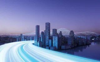 Futuristic city skyline at dusk with illuminated skyscrapers, glowing digital data networks, and light trails representing high-speed connectivity. Concept of smart cities, digital transformation, and next-generation urban infrastructure powered by technology and innovation