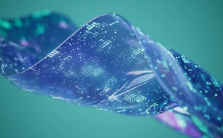 Close-up of a shimmering blue and purple digital fabric or ribbon representing data flow and technology