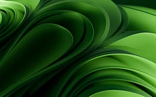 Abstract background with swirling and flowing shapes in shades of green, creating a dynamic, organic, and visually engaging design - stock photo