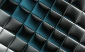 Abstract geometric background featuring a repeating pattern of metallic black, silver and teal-blue triangular shapes with reflective lighting, creating a three-dimensional, faceted surface for modern technology, digital innovation and corporate design themes