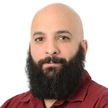 A headshot of Anthony Malakian.