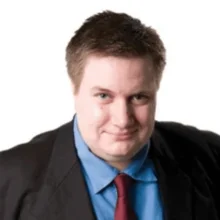 A headshot of Max Bowie, Editor-at-large at WatersTechnology.