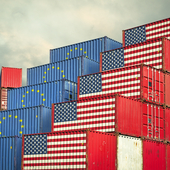 Cargo containers with EU and United States flag - stock photo