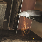 Close-up of a Man Sharpening a Knife.