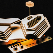 Architect’s hotel model on top of a reel-to-reel tape recorder, from the album cover of Tranquility Base Hotel + Casino by Arctic Monkeys