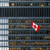 Canada flag and building